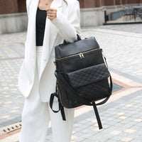 Luxury Vegan Leather Diaper Bag - Quilted Design with large capacity and accessories.