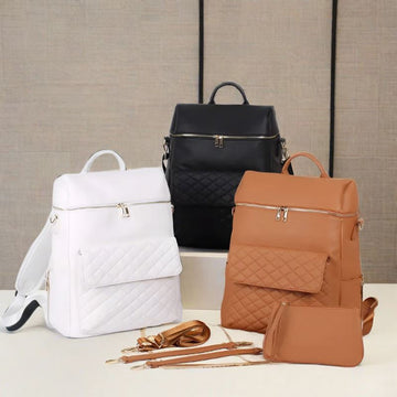 Luxury Vegan Leather Diaper Bag - Quilted Design with large capacity and accessories.