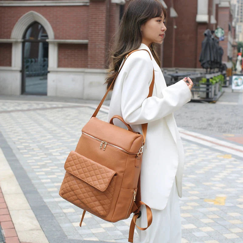Luxury Vegan Leather Diaper Bag - Quilted Design with large capacity and accessories.