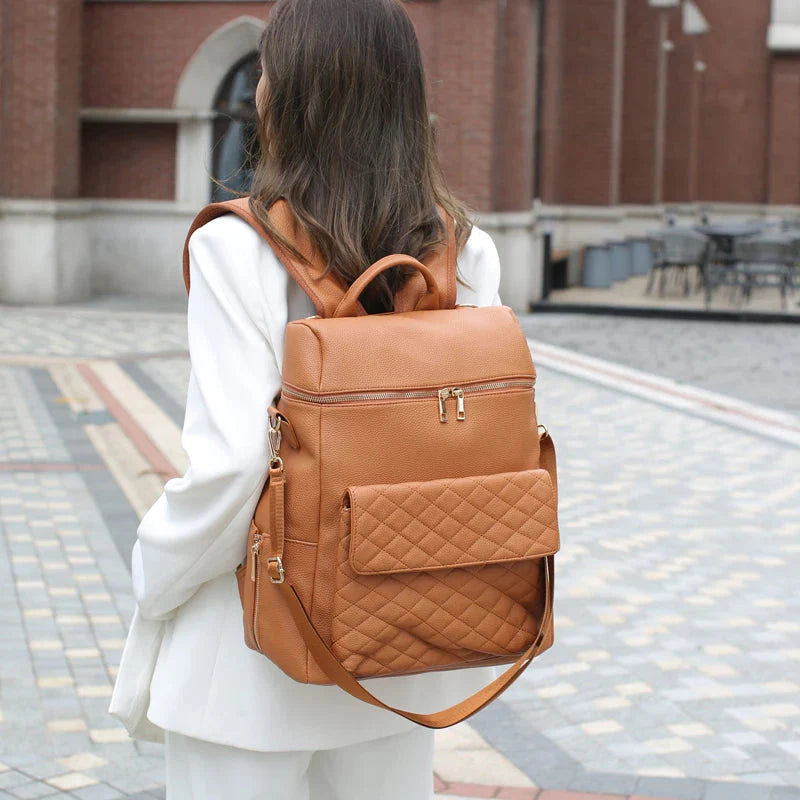 Luxury Vegan Leather Diaper Bag - Quilted Design with large capacity and accessories.