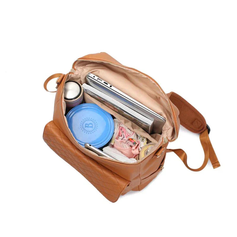 Luxury Vegan Leather Diaper Bag - Quilted Design with large capacity and accessories.