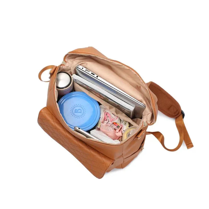 Luxury Vegan Leather Diaper Bag - Quilted Design with large capacity and accessories.