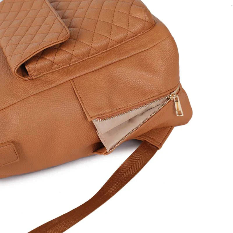 Luxury Vegan Leather Diaper Bag - Quilted Design with large capacity and accessories.